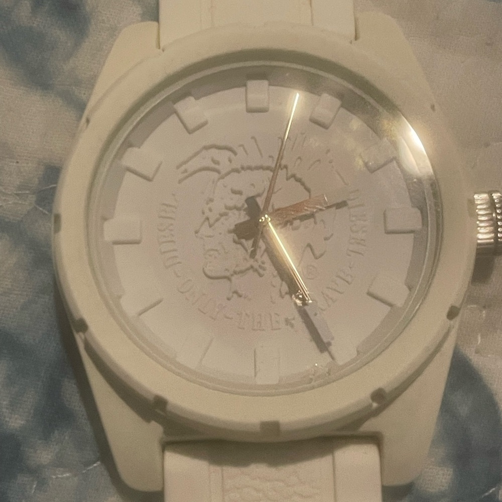 Diesel White Watch. Needs battery.